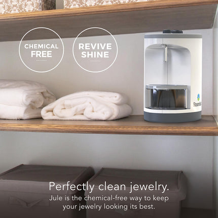 Jewelry cleaner on a shelf with towels and text highlighting features