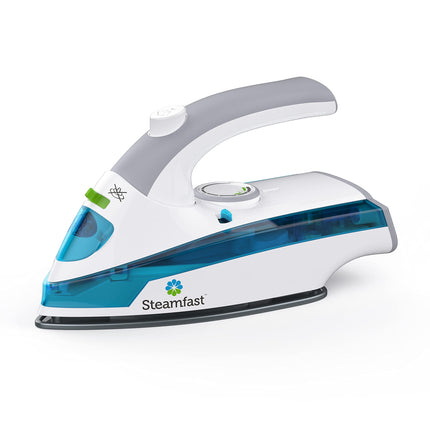 White and blue Steamfast iron on a white background