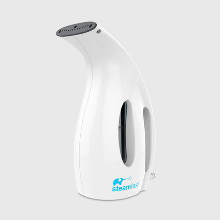 White handheld steamer with 'Steamfast' branding on a light gray background