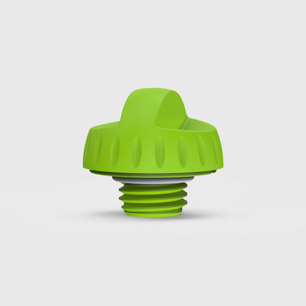 Green silicone bottle cap on a light gray background