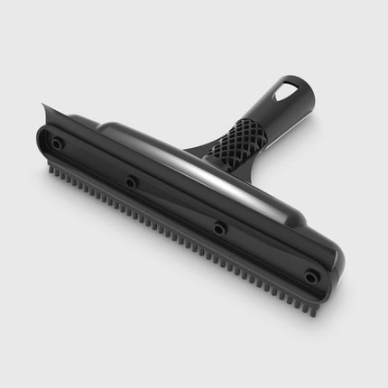 Black squeegee on a light gray background