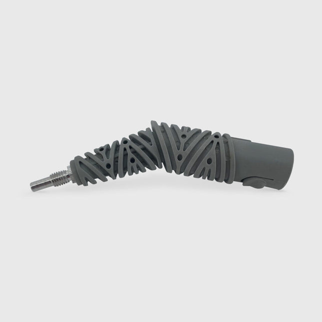 Gray steaming tool with a unique design on a white background