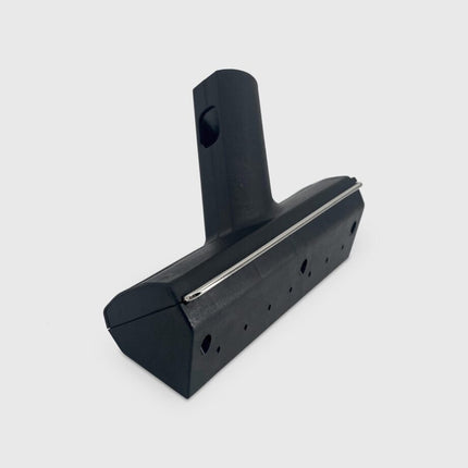 Black scraping tool with a handle on a white background