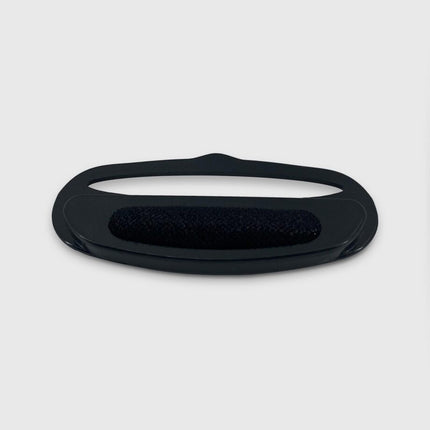 Black rubber gasket on a white background