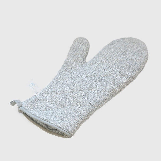 White oven mitt on a light gray background