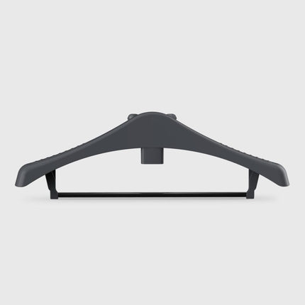 Black plastic hanger on a light gray background