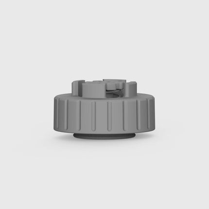 Gray plastic cap on a light gray background