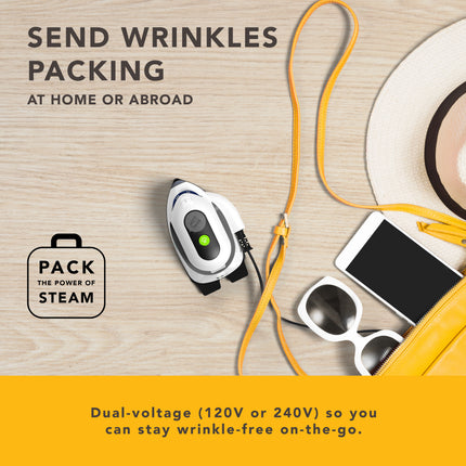 Steam iron with accessories on a wooden surface, promoting wrinkle removal at home or abroad.
