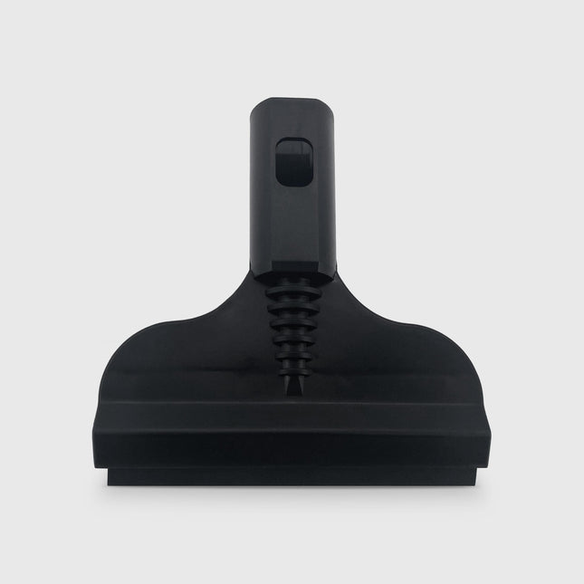 Black vacuum cleaning tool on a white background