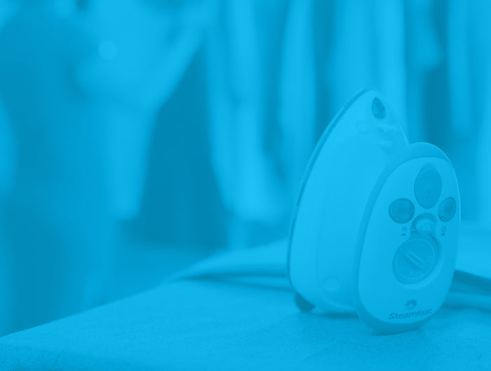 Steamfast steam Iron after being used with a blue overlay.